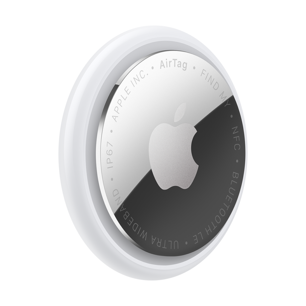 AirTag, 1 τεμάχιο, κυκλικό σχήμα, εξωτερικός λευκός δακτύλιος, εξωτερική πλαϊνή όψη από μπροστά, ανακλαστικό ασημί υλικό, λογότυπο της Apple στο κέντρο, κείμενο περιμετρικά που γράφει: AirTag - FIND MY - NFC - BLUETOOTH LE - ULTRA WIDEBAND - IP67 - APPLE INC